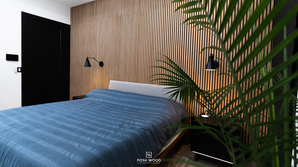 Bedroom with wood slat paneling accent wall